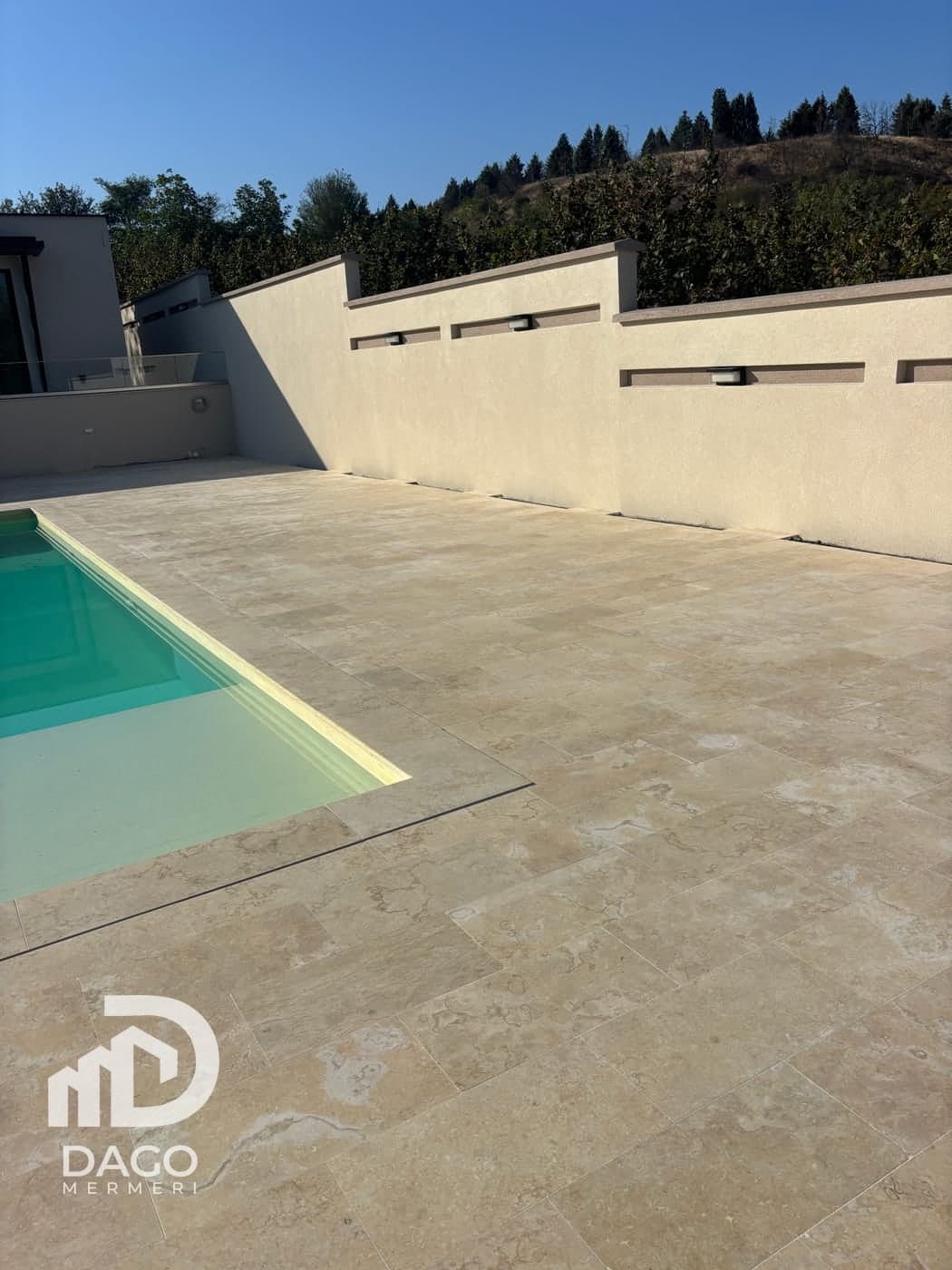 Pool with yellow marble coping