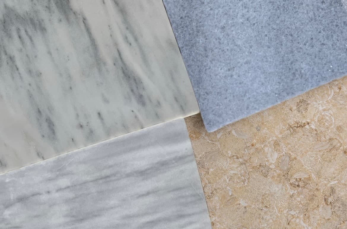 Four marbles side by side: Kavala White, Kavala Grey, Mura and Sapphire